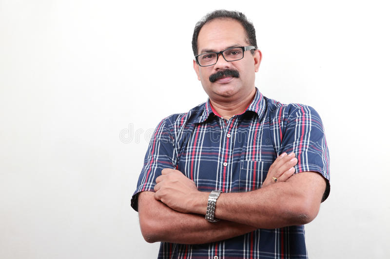middle-aged-indian-folded-hands-portrait-52589369